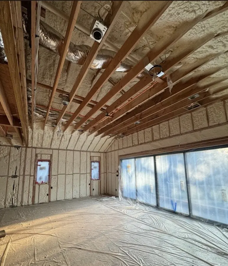Interior walls and ceiling insulated with spray foam during new construction in Oak Park